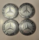 New Genuine Oem 98-25 Mercedes Benz Center Caps Set A1714000125 Laurel Wreath. Fixed Price $22.95.